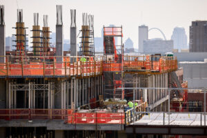 construction site of the neuroscience research building at washington university school of medicine with the st. louis arch in the background