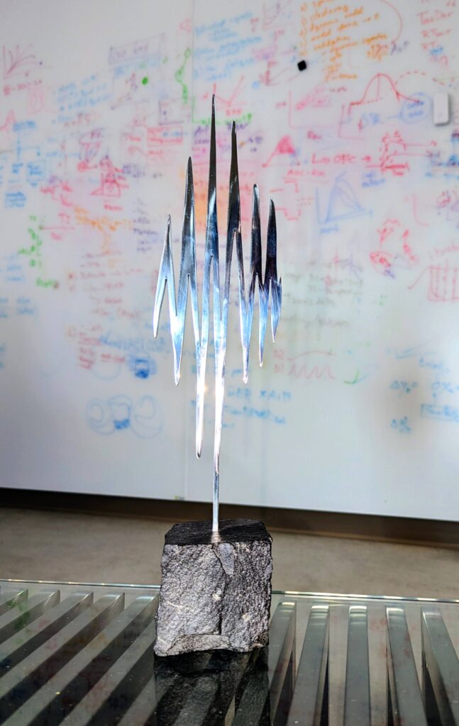 Metal sculpture of a “sharp wave ripple,” a hippocampal brain wave first described by György Buzsáki