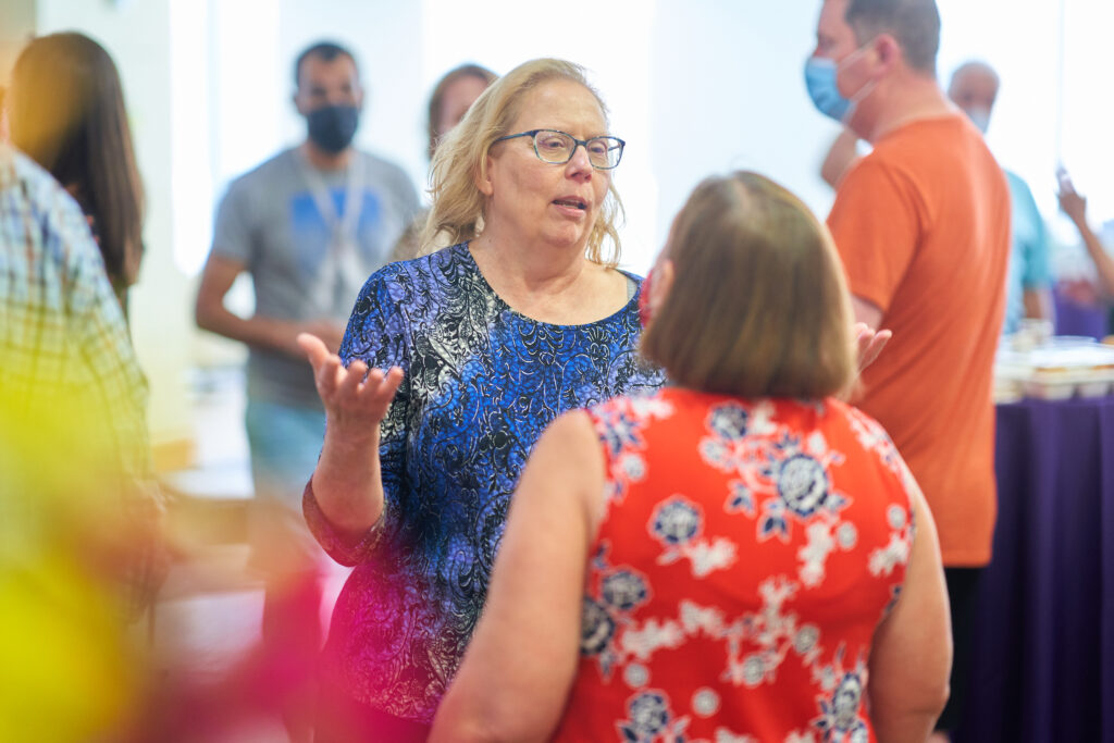 Tami Evans speaking to Mary Heeley