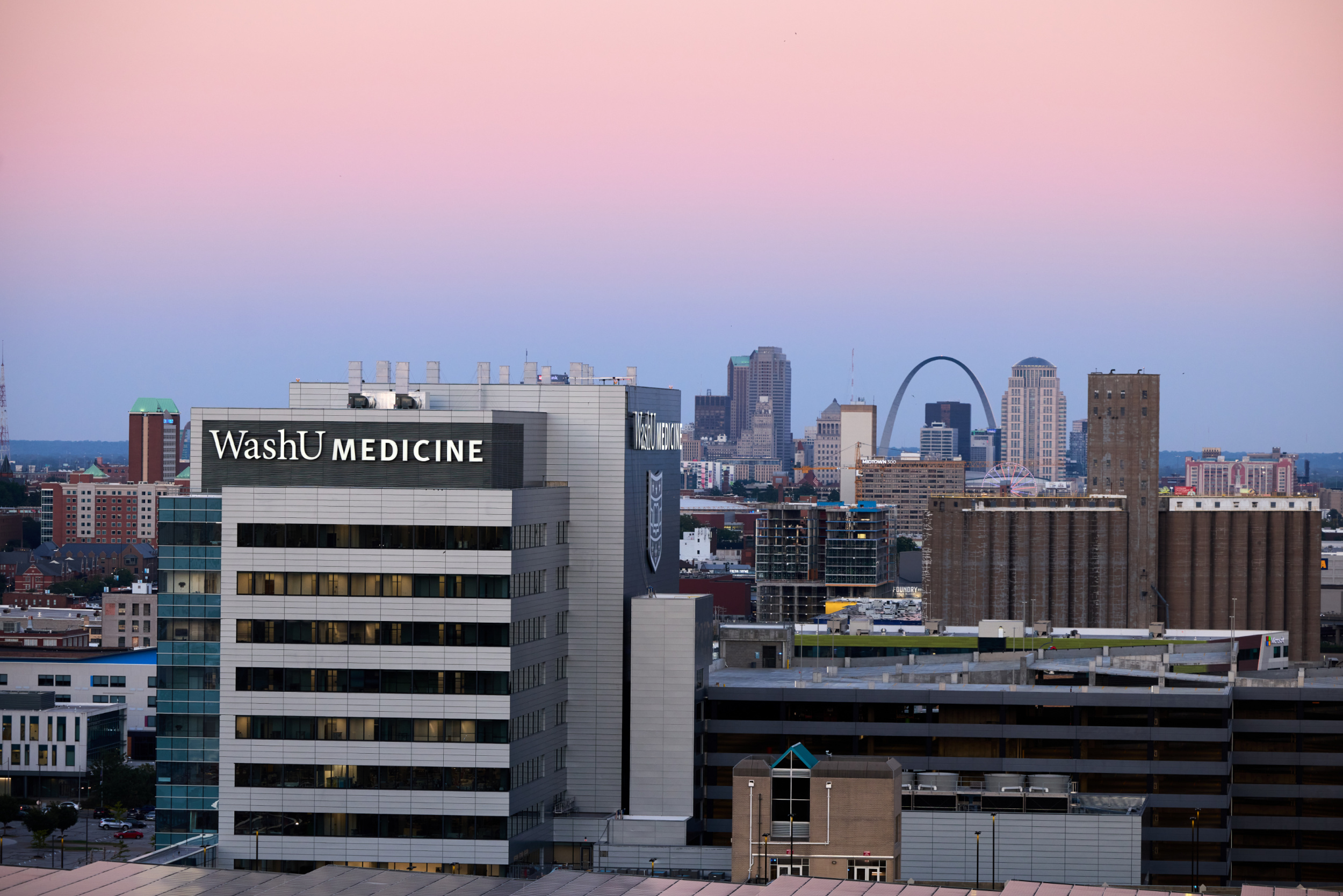 Neuroscience Research Building at Washington University with St. Louis arch and skyline in background