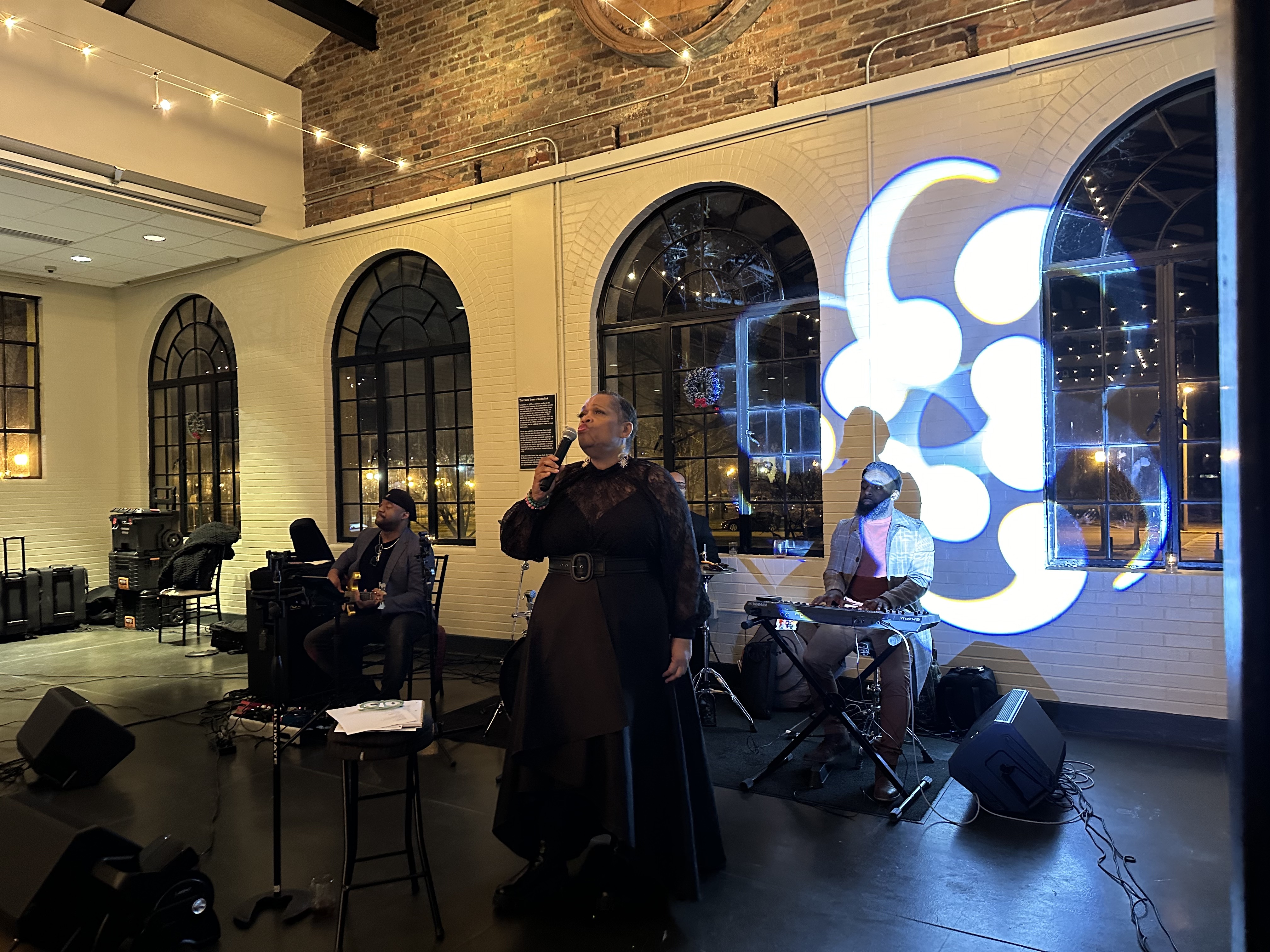 Anita Jackson performing with band at Trolley Room in Forest Park