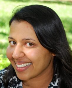 Ila Fiete is a woman with long dark hair.