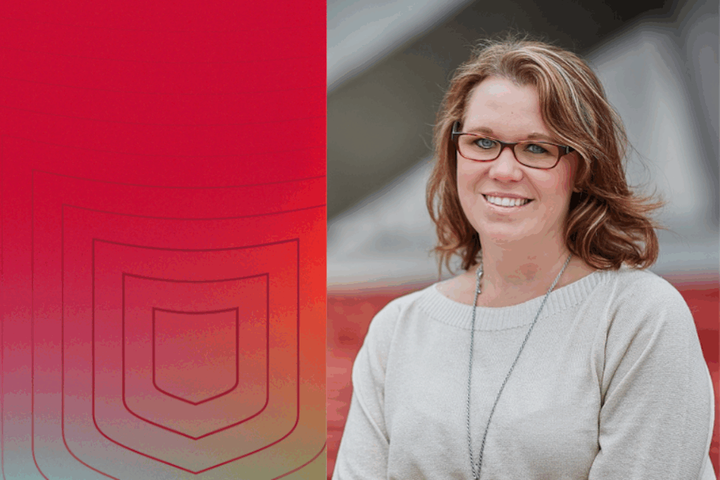 Wendy Bridges is the new business director for the WashU Medicine Department of Neuroscience. She is a woman with glasses and shoulder length hair wearing a pearl colored top.