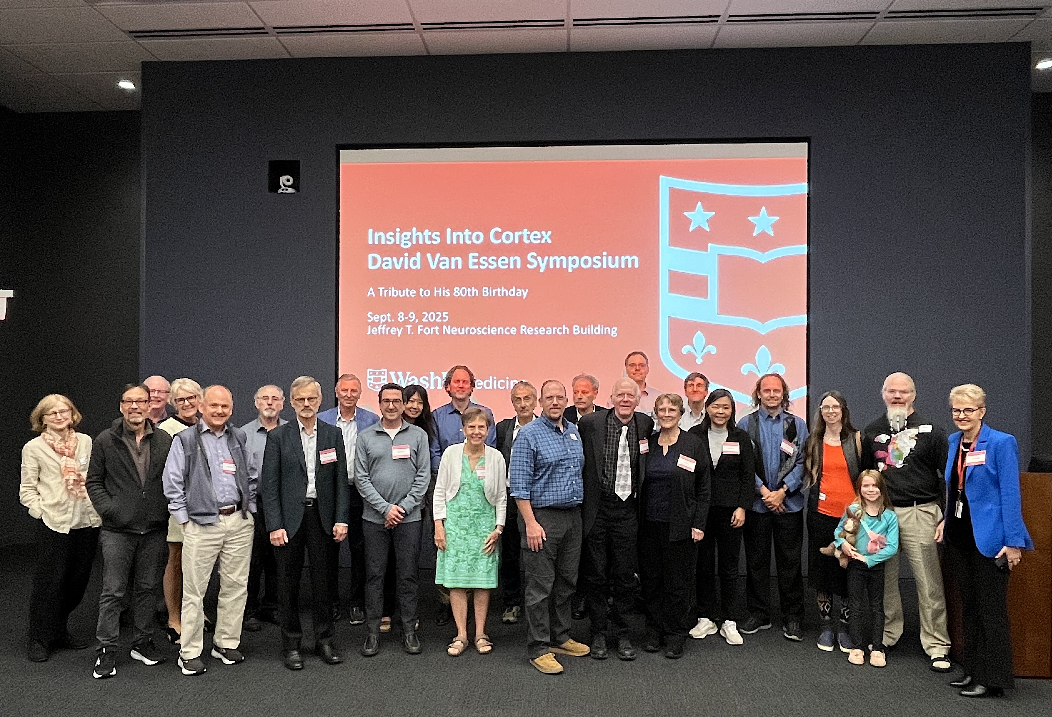 Speakers of the David Van Essen Symposium gather in an auditorium.