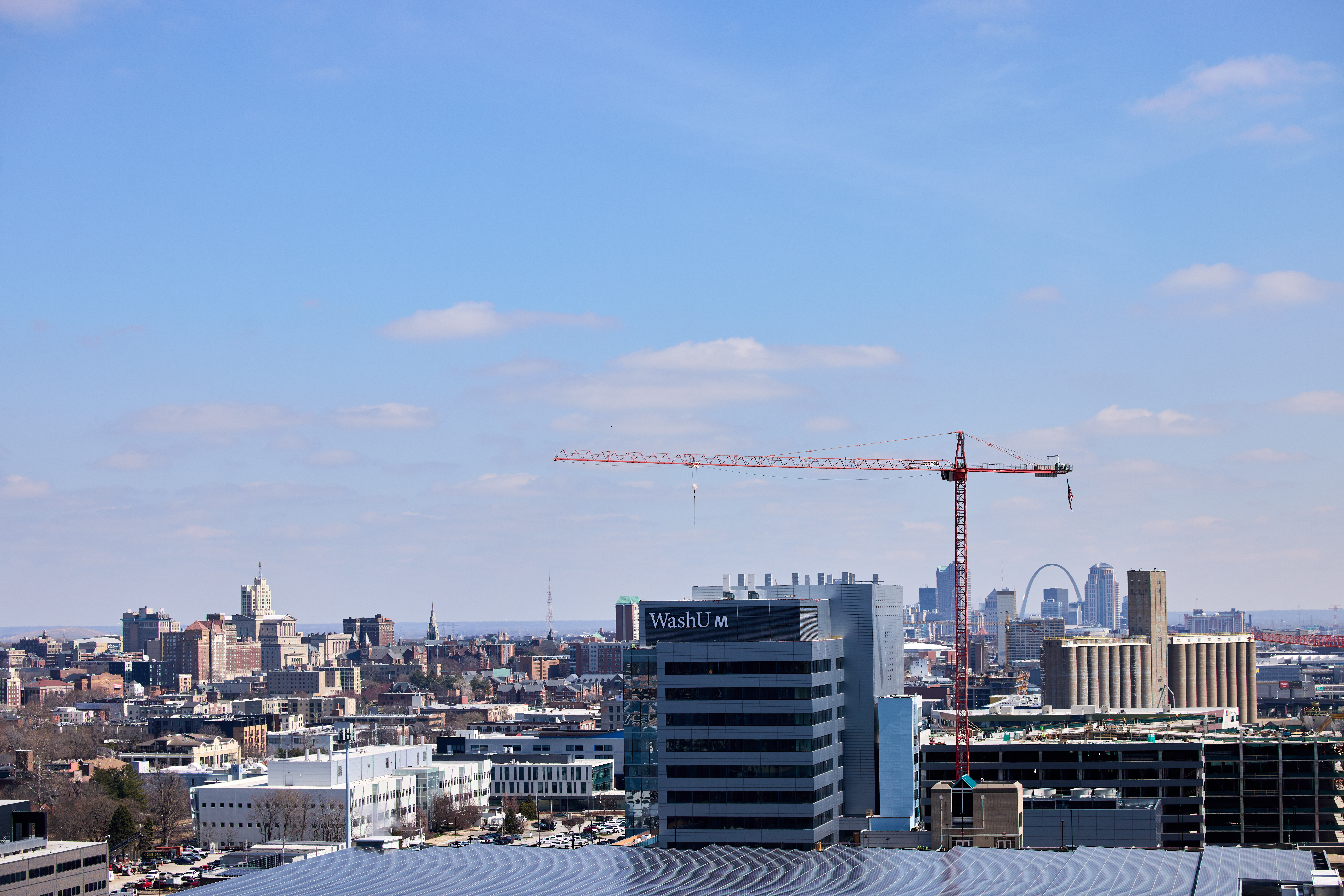 Washington University Neuroscience Research Building under construction with a crane overhead