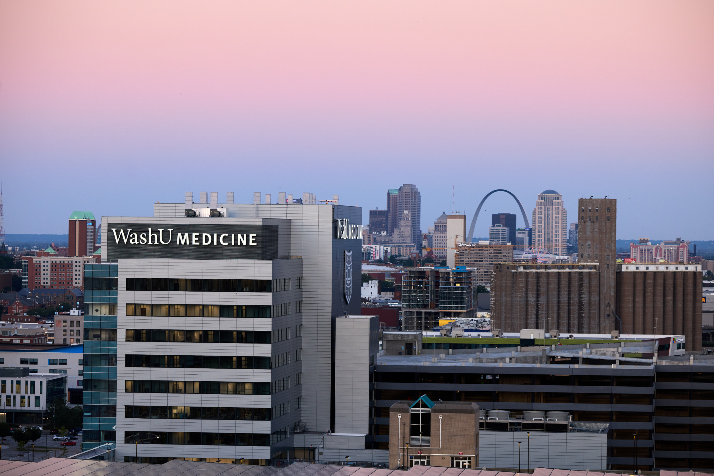 Neuroscience research building at Washington University in St. Louis with skyline and arch in background